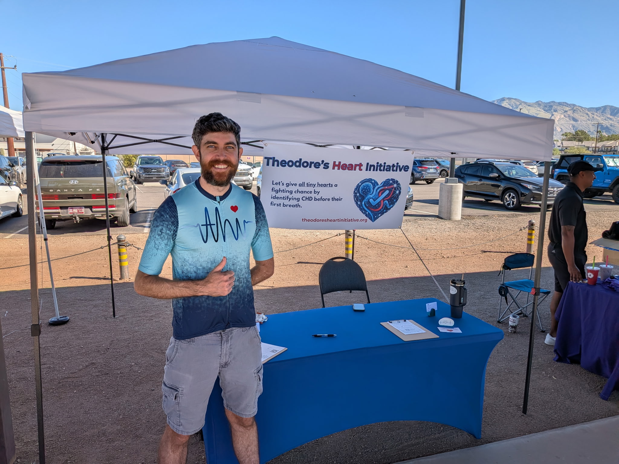 Chris at the Theodore's Heart Initiative booth at the Pima County Loop de Loop